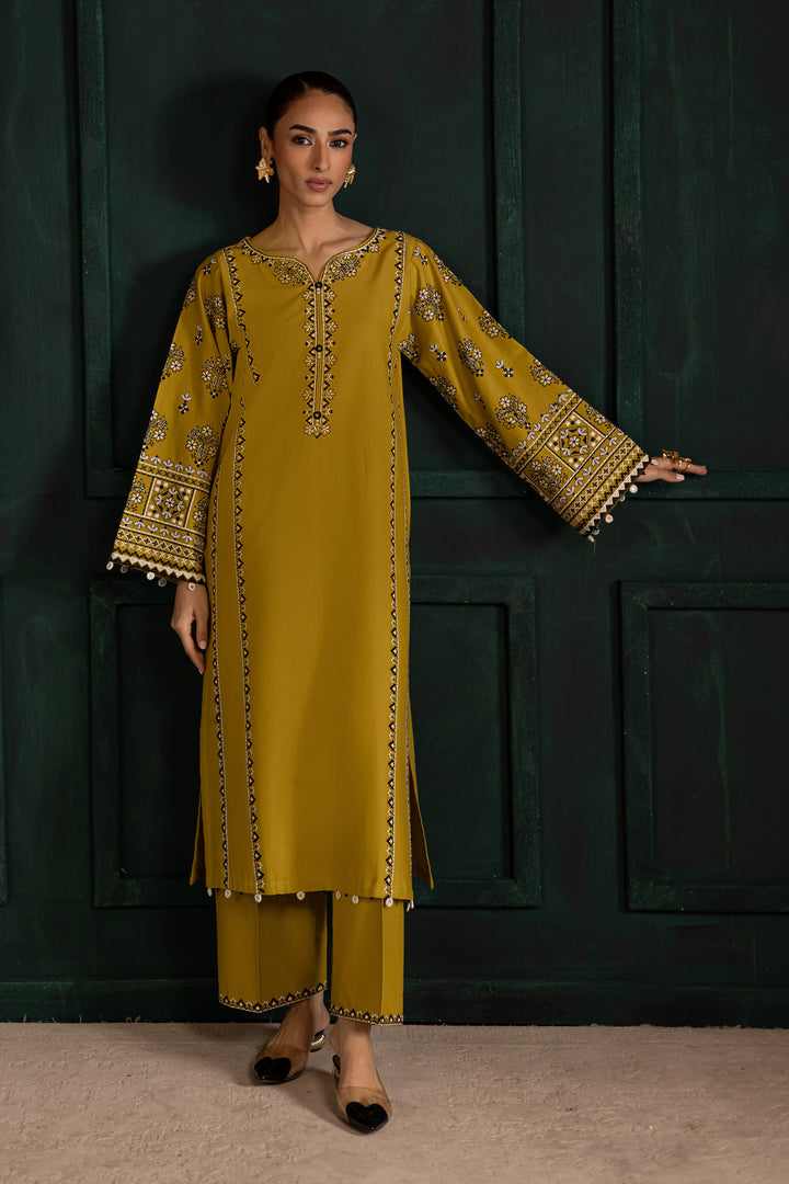 Batik lemon green khaddar outfit with elegant embroidery and refined craftsmanship. Affordable ethnic Pakistani South Asian.