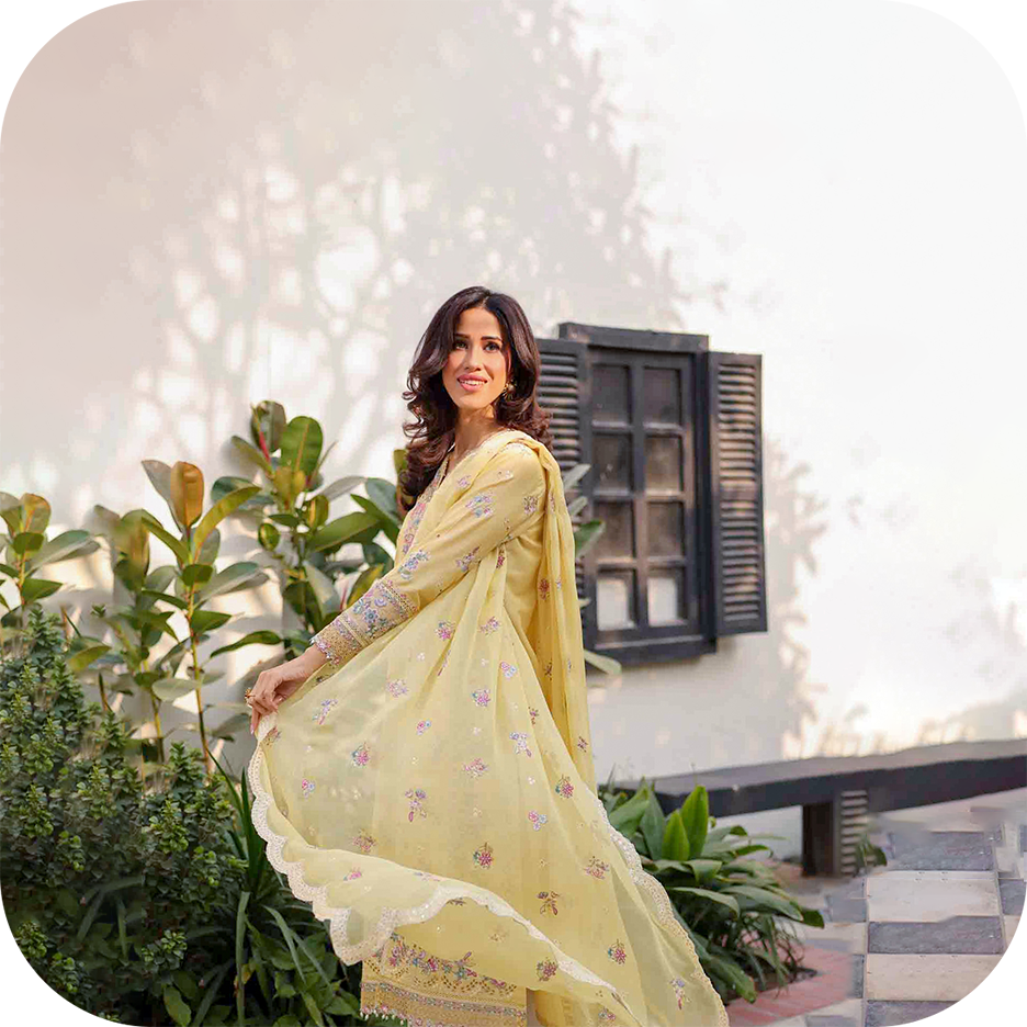 Eid lawn luxury outfit styled for daytime Eid celebrations by BATIK  Eid lawn jora with embroidered details from BATIK Luxury Lawn Eid Edit  Eid lawn outfit styled for day to night Eid wear  Luxury eid lawn dress with composed embroidery and festive 
