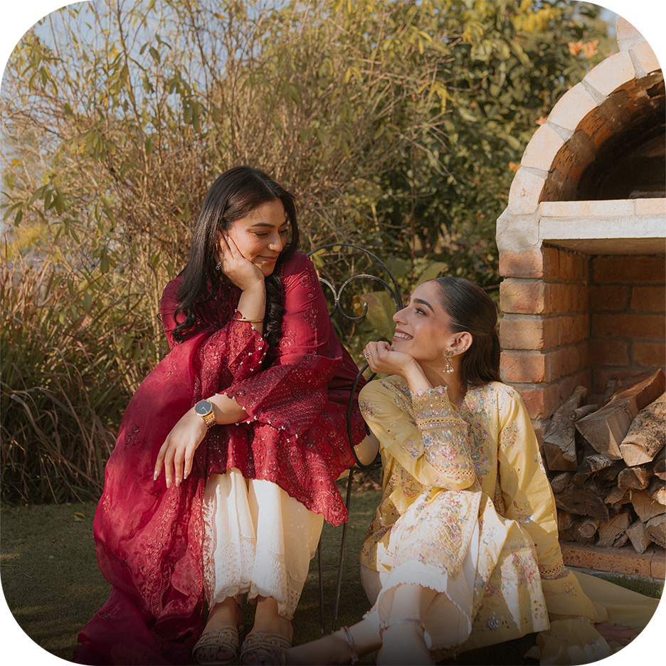 influencer styling elegant black embroidered eid outfits with delicate festive detailing outdoors.  Image 2 (Maroon festive lawn look) Influencer wearing deep maroon festive with intricate embroidery and lace sleeves.  Image 3