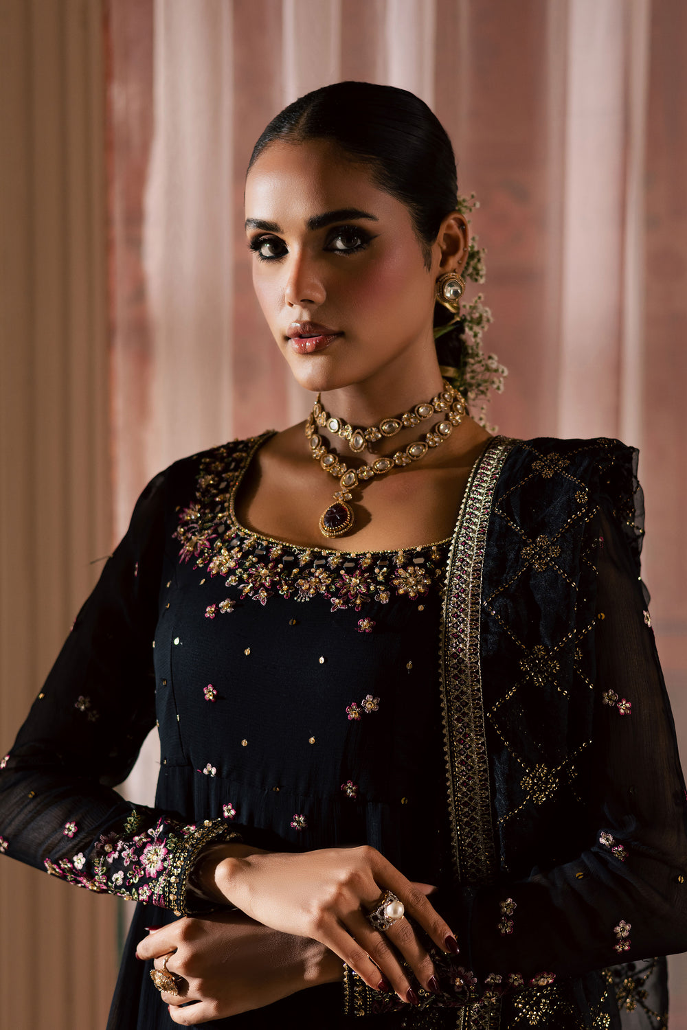 Gulnaar – The Embroidered Luxe Frocks is a celebration of refined South Asian craftsmanship. The collection features intricately detailed chiffon, crinkle, and net frocks enhanced with adda, resham, and sequin work. Designed in a range of rich tones and soft pastels, each 3-piece ensemble includes a coordinating dupatta and raw silk trouser. Available in sizes S, M, and L, the collection blends traditional embroidery with modern silhouettes—perfect for festive gatherings, formal occasions, and wedding guest