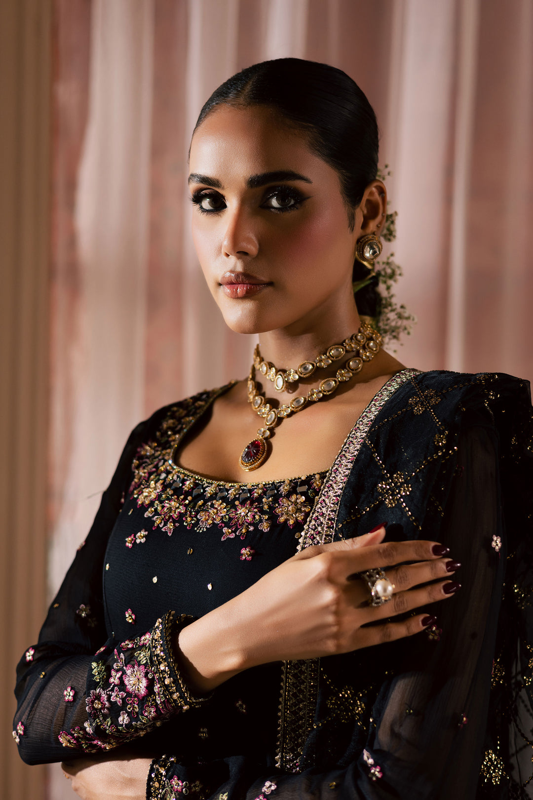 Gulnaar – The Embroidered Luxe Frocks is a celebration of refined South Asian craftsmanship. The collection features intricately detailed chiffon, crinkle, and net frocks enhanced with adda, resham, and sequin work. Designed in a range of rich tones and soft pastels, each 3-piece ensemble includes a coordinating dupatta and raw silk trouser. Available in sizes S, M, and L, the collection blends traditional embroidery with modern silhouettes—perfect for festive gatherings, formal occasions, and wedding guest